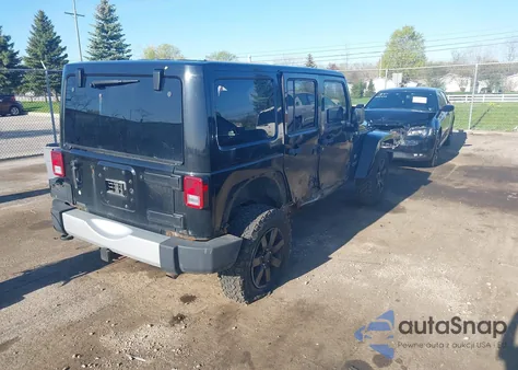 2011 Jeep Wrangler Unlimited 70Th Anniversary z USA, uszkodzony, nr VIN 1J4BA7H1XBL616117